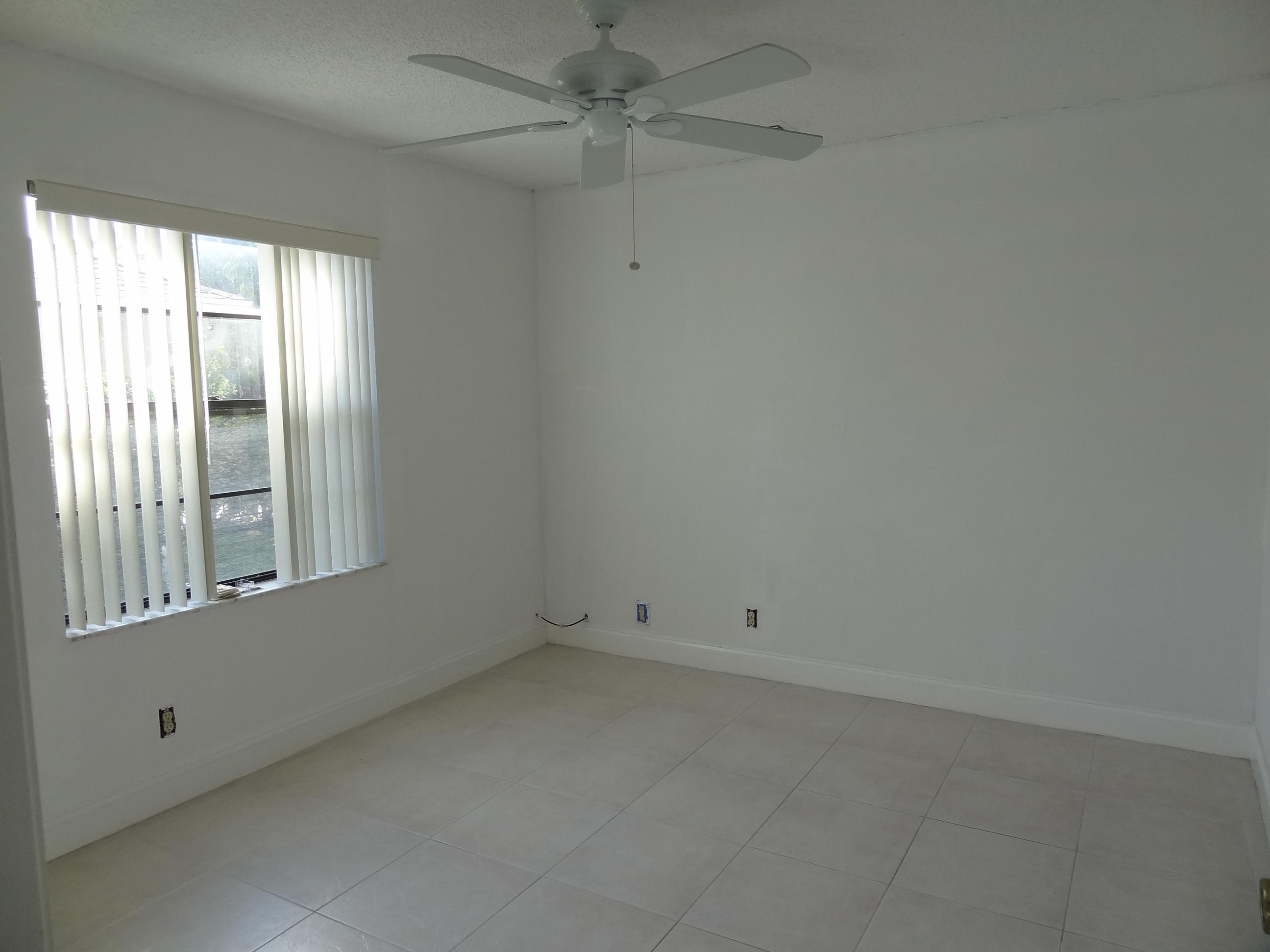 9936 Majorca Place Boca Raton, FL 33434 - Photo 19 of 21 TILED SECOND BEDROOM