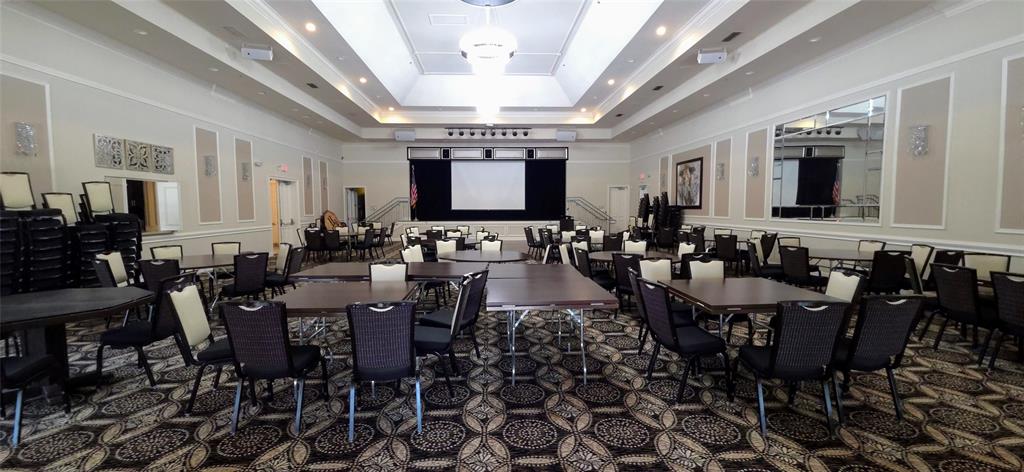 6898 Grenelefe Road Boynton Beach, FL 33437 - Photo 46 of 65 a large dining space with furniture a rug and a chandelier