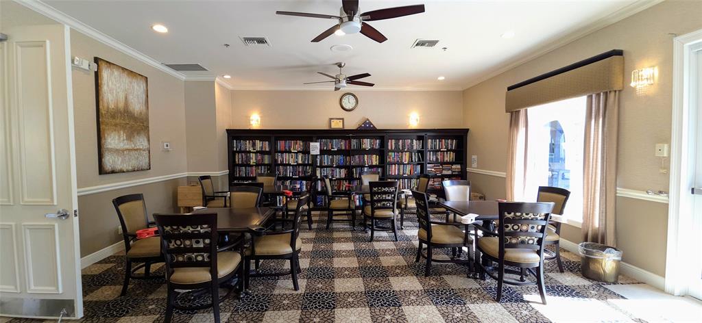 6898 Grenelefe Road Boynton Beach, FL 33437 - Photo 49 of 65 a room with lots of wooden furniture and windows