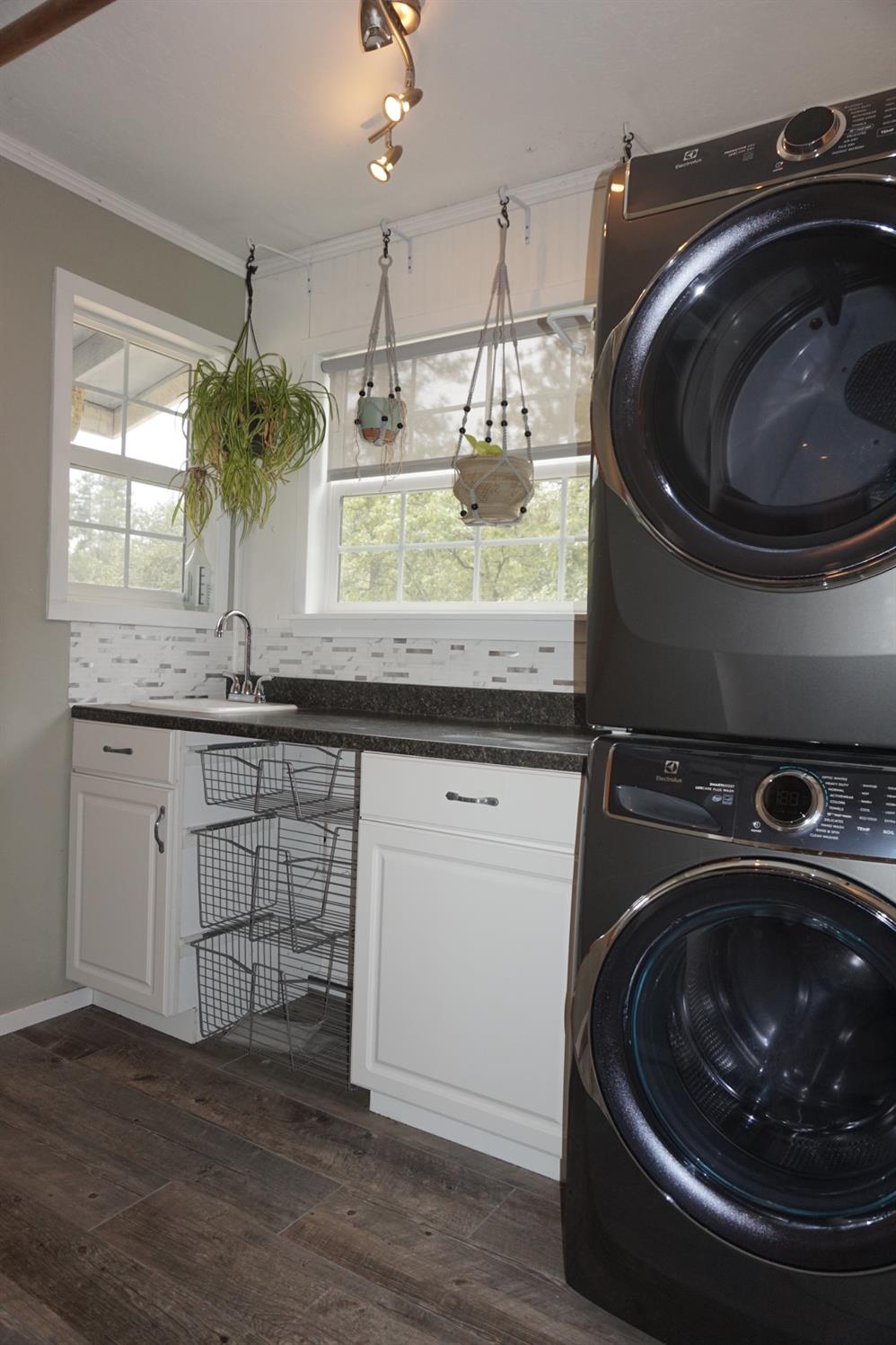 20480 Timber Ridge Road Pine Grove, CA 95665 - Photo 26 of 56 a kitchen with a sink and a stove top oven