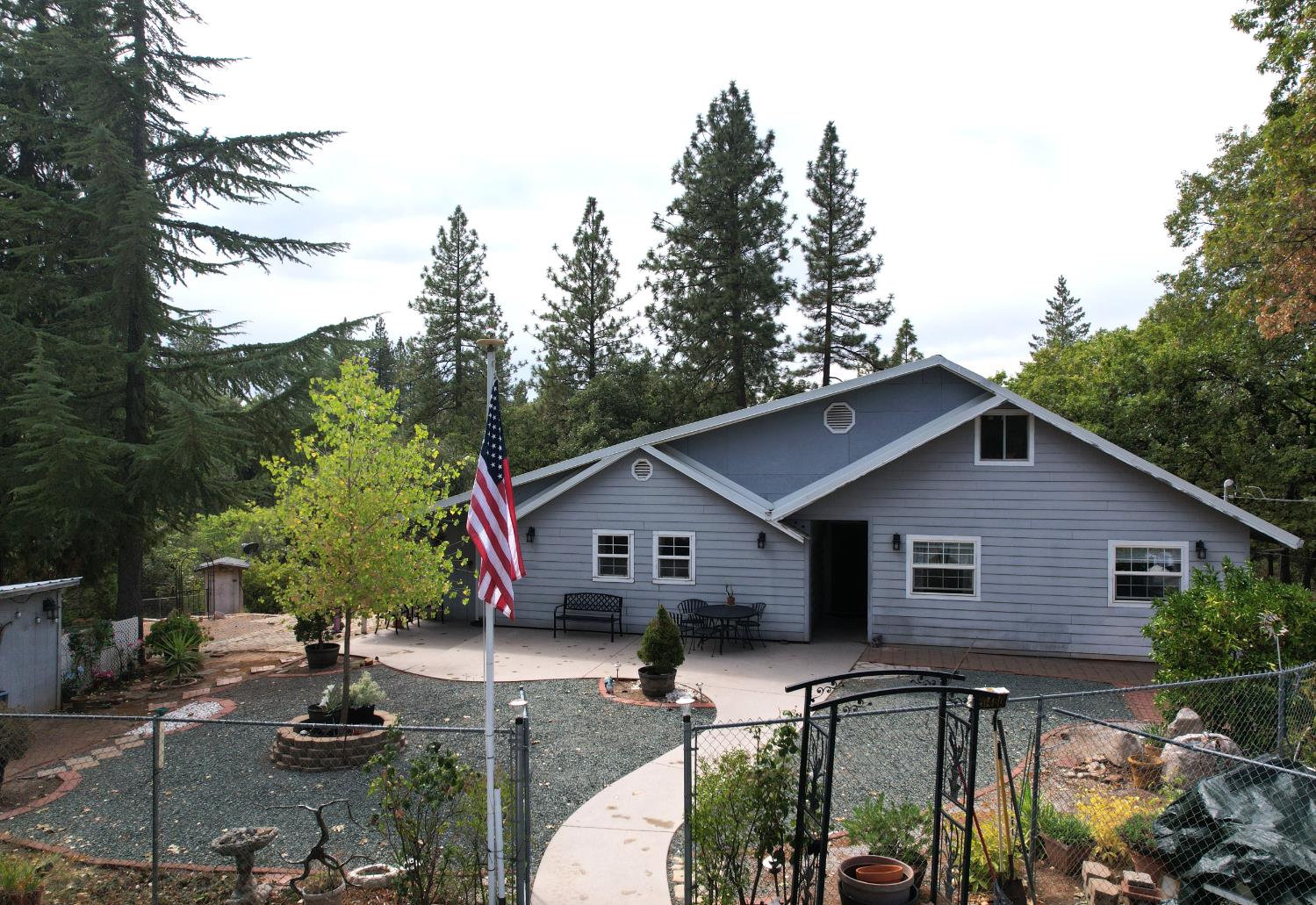 20480 Timber Ridge Road Pine Grove, CA 95665 - Photo 3 of 56 a view of a house with backyard