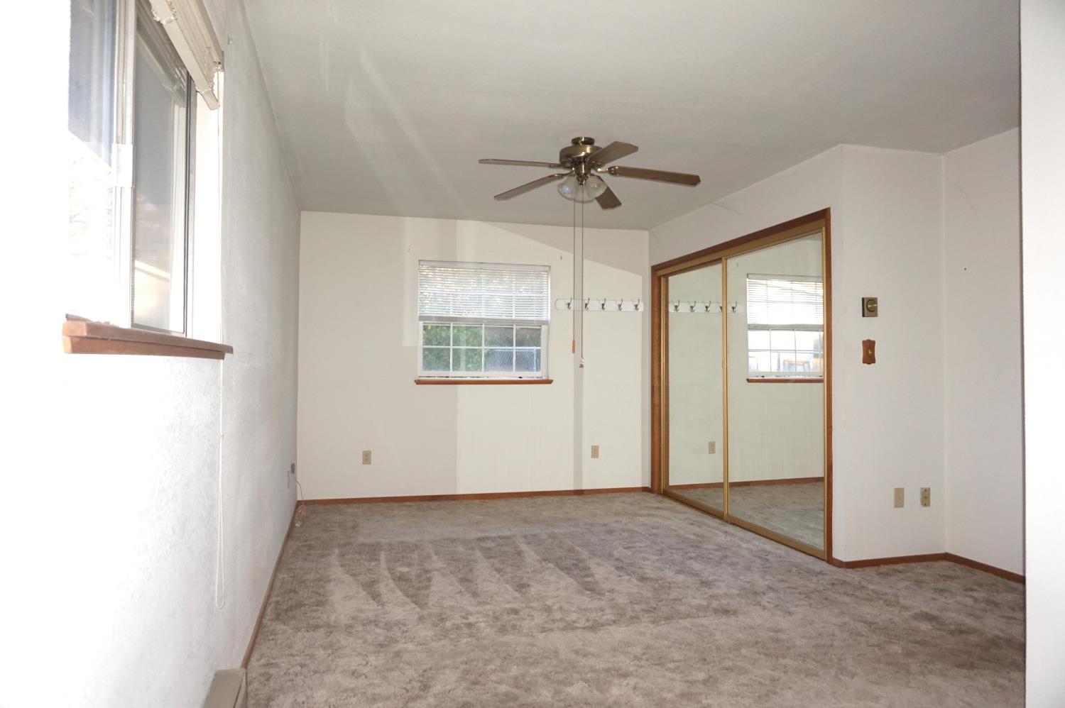 20480 Timber Ridge Road Pine Grove, CA 95665 - Photo 35 of 56 a view of room with a ceiling fan and window