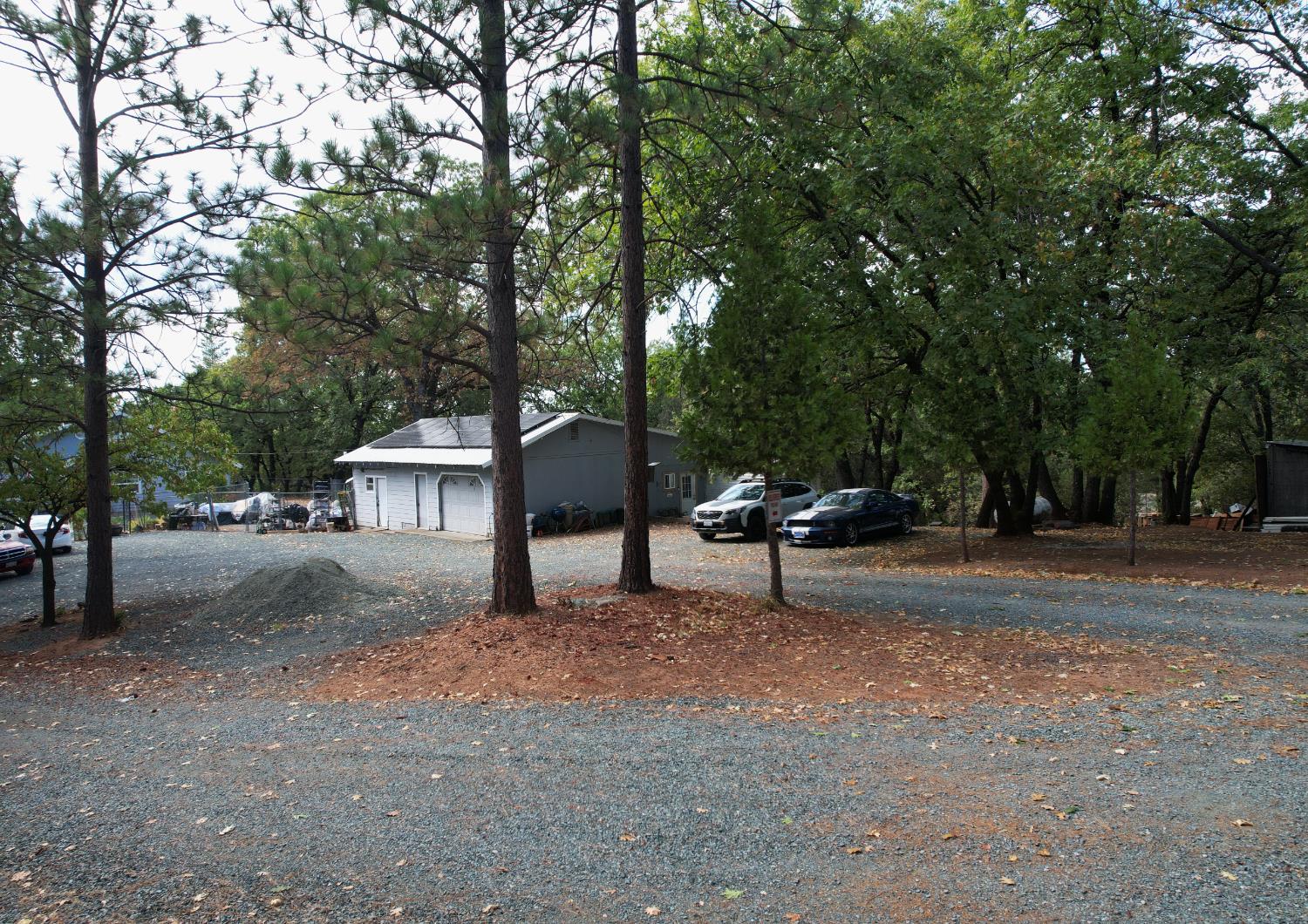 20480 Timber Ridge Road Pine Grove, CA 95665 - Photo 6 of 56 a view of a house with a sink and a fire pit