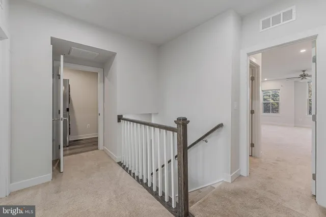 a view of a hallway with entryway