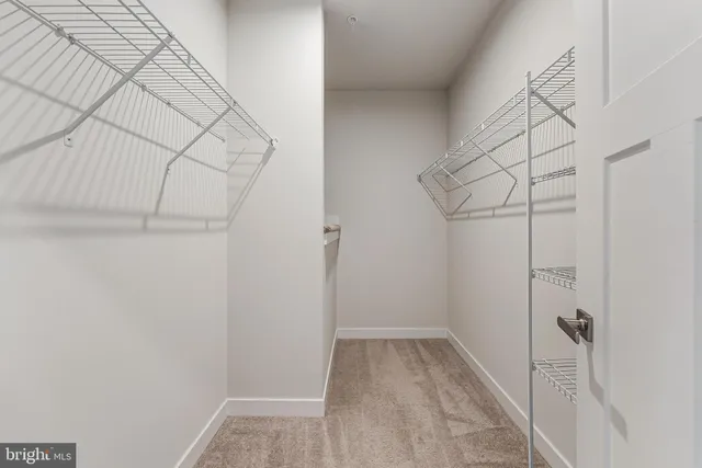 a view of a room with racks on the wall