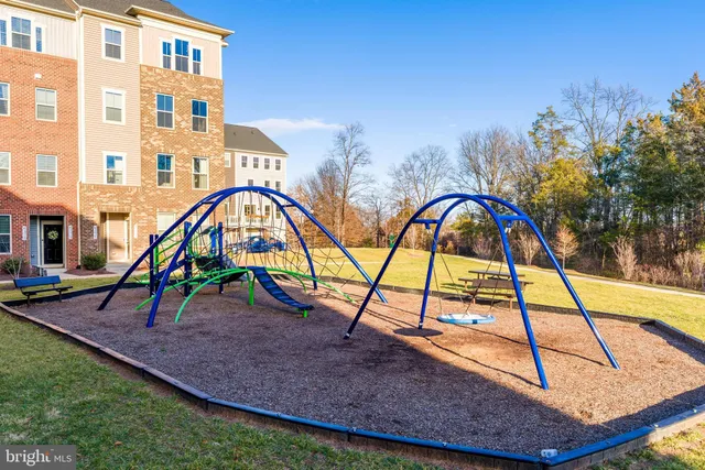 a view of building with pool windows