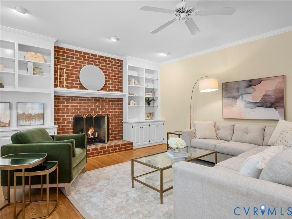 2011 Gamelaw Court Midlothian, VA 23113 - Photo 21 of 77 a living room with furniture and a fireplace