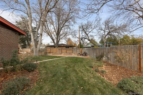 a view of backyard with green space