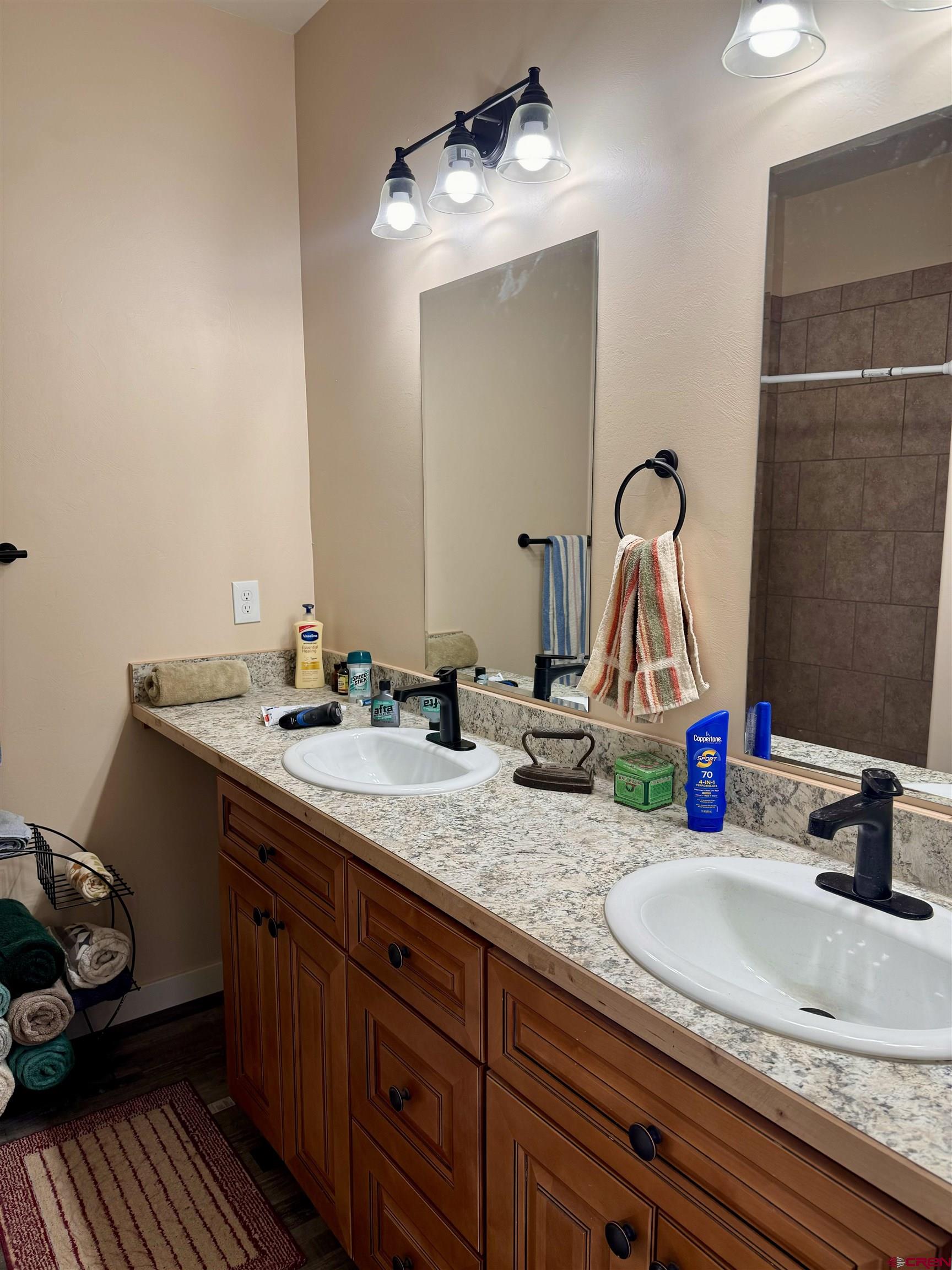 23184 D50 Road Delta, CO 81416 - Photo 14 of 23 a bathroom with a sink double vanity and a mirror