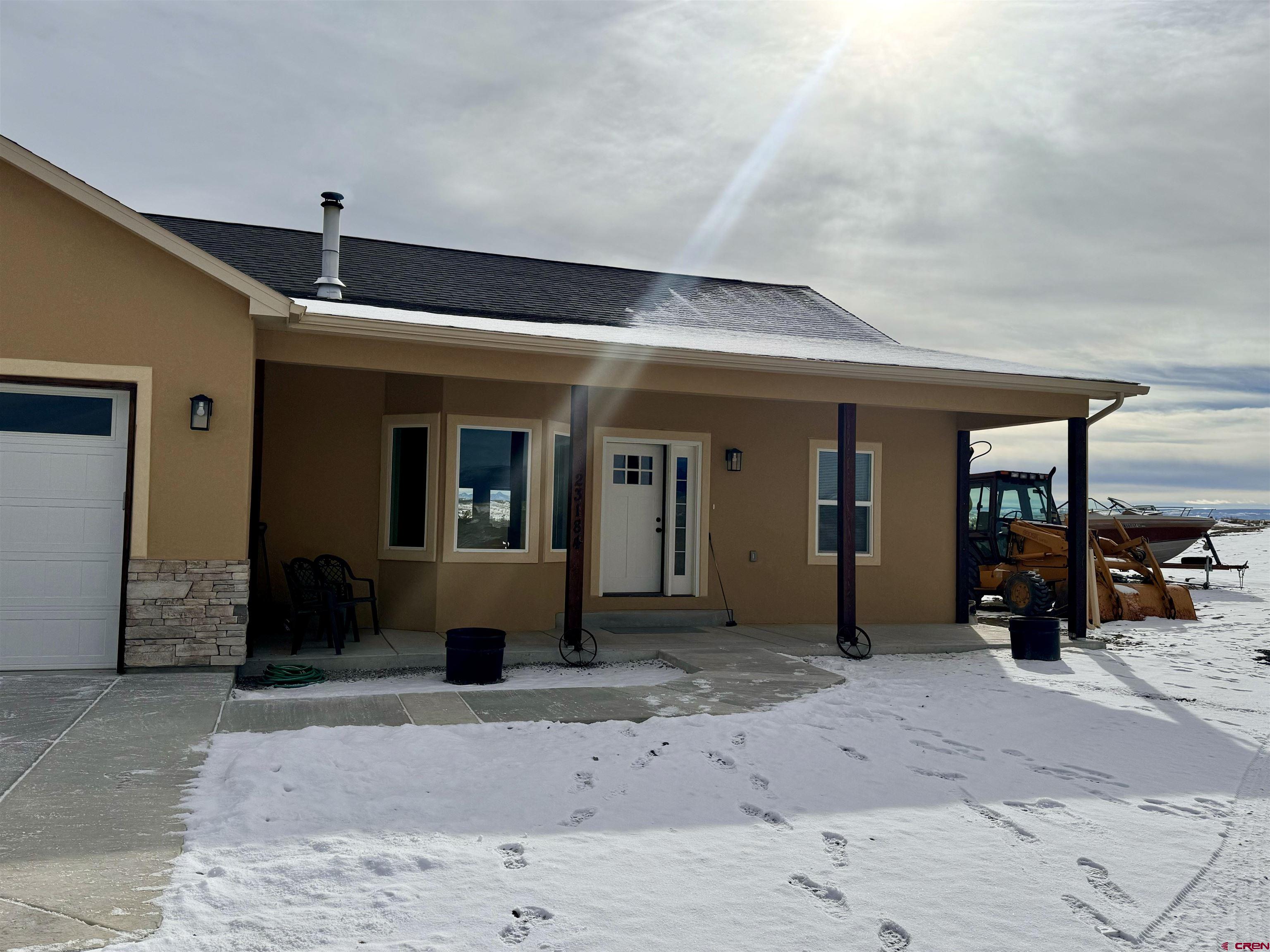 23184 D50 Road Delta, CO 81416 - Photo 3 of 23 a front view of a house