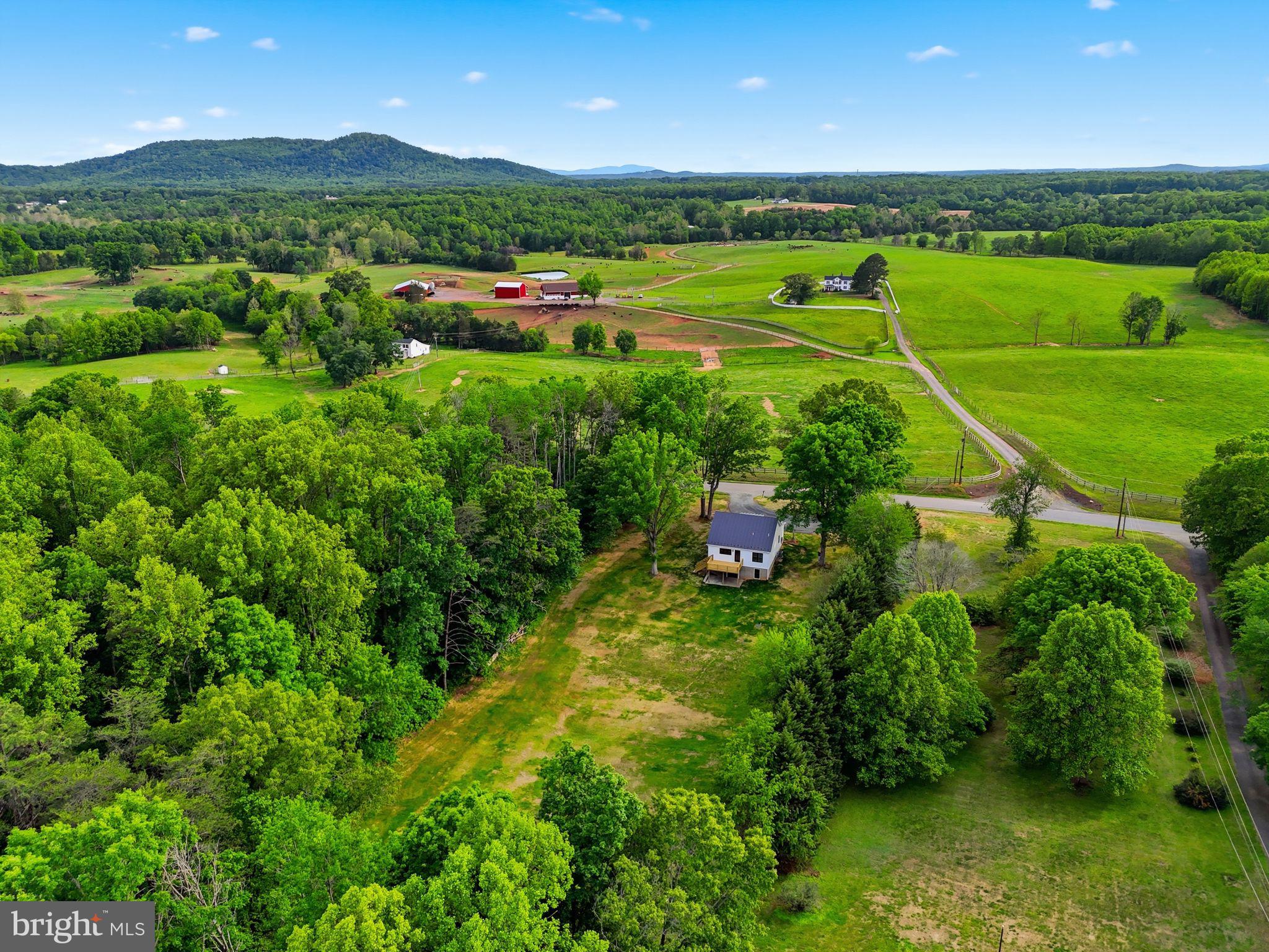 1548 James City Road Reva, VA 22735 - Photo 39 of 48 a view of a lush green outdoor space with a lake view
