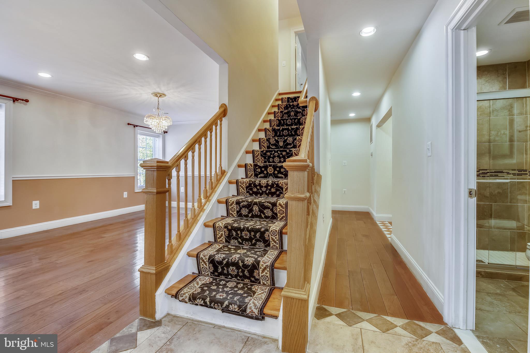 10603 Brunswick Avenue Silver Spring, MD 20902 - Photo 15 of 40 Stairway Leading Upper Level/Main Floor Hallway