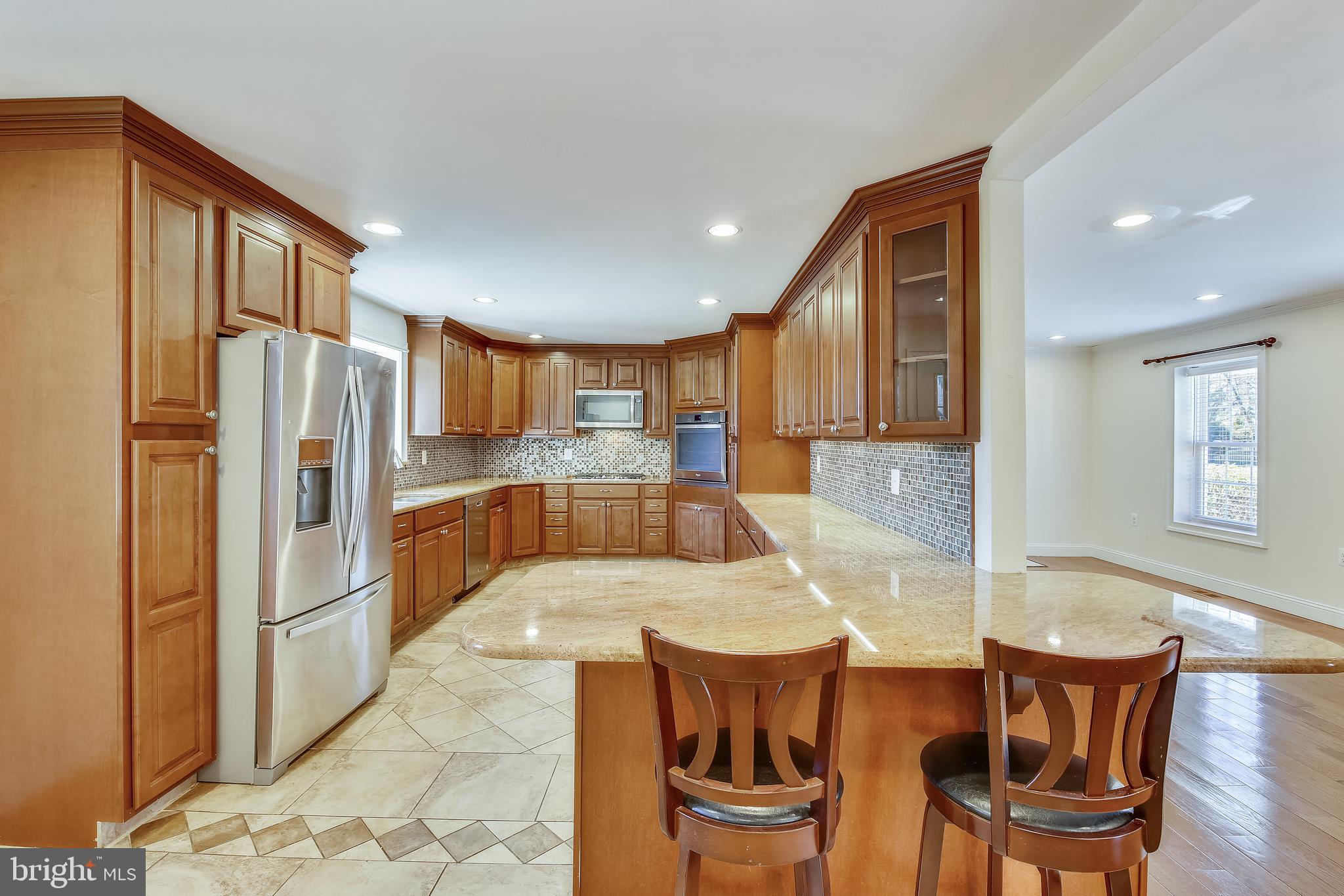 10603 Brunswick Avenue Silver Spring, MD 20902 - Photo 6 of 40 Kitchen With Breakfast Counter