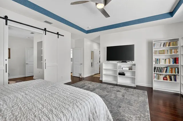 an aerial view of a house with a yard and garden view