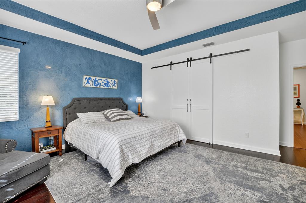 591 Northwest Library Commons Way Boca Raton, FL 33432 - Photo 45 of 75 a bedroom with a bed and a walk in closet