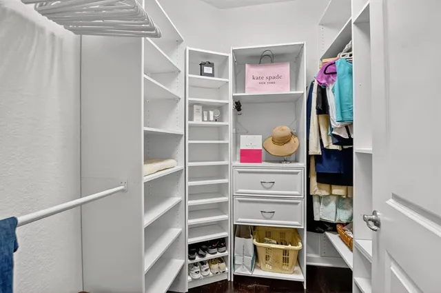 an aerial view of multiple houses with yard