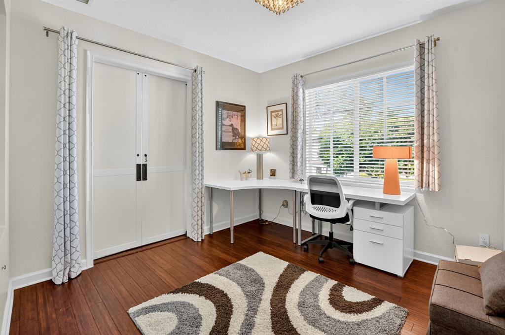 591 Northwest Library Commons Way Boca Raton, FL 33432 - Photo 51 of 75 a living room with furniture and a large window