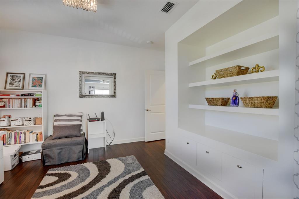 591 Northwest Library Commons Way Boca Raton, FL 33432 - Photo 52 of 75 a bedroom with furniture and a book shelf