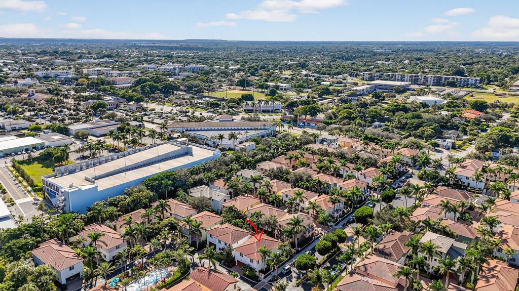 591 Northwest Library Commons Way Boca Raton, FL 33432 - Photo 69 of 75 an aerial view of a city with lots of residential buildings