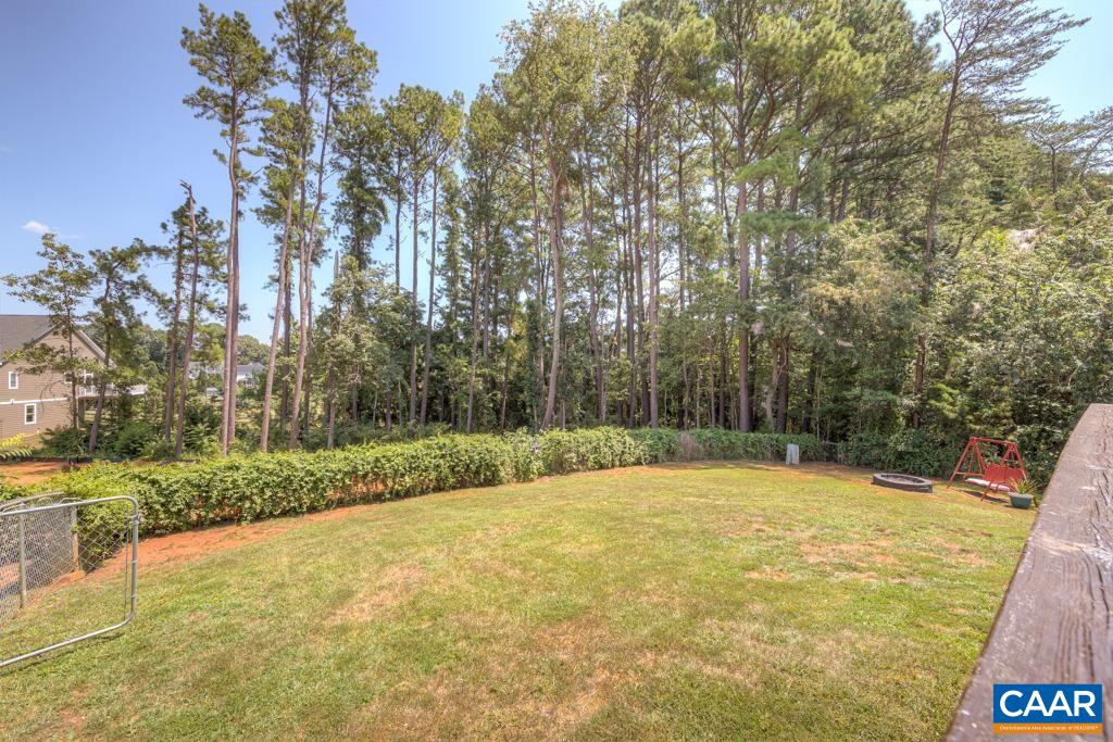 235 Spring Oaks Lane Ruckersville, VA 22968 - Photo 20 of 44 a view of a swimming pool and a yard