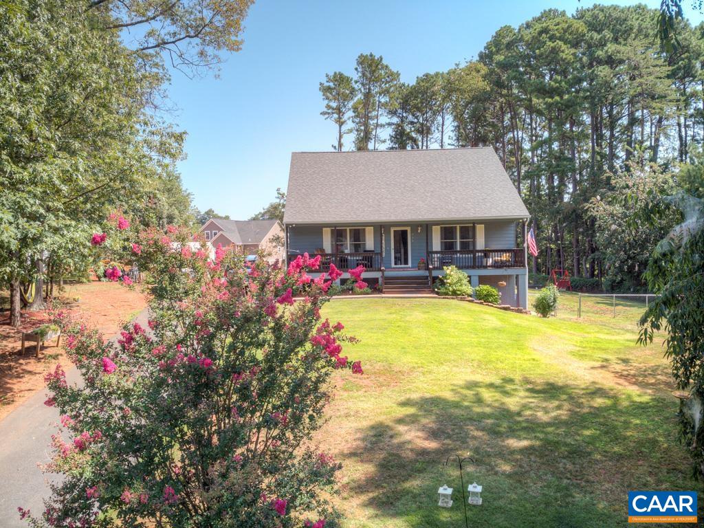 235 Spring Oaks Lane Ruckersville, VA 22968 - Photo 2 of 44 a view of a house with swimming pool and porch with furniture