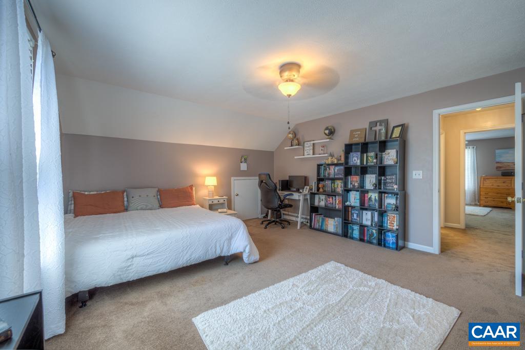 235 Spring Oaks Lane Ruckersville, VA 22968 - Photo 30 of 44 a bedroom with a bed and closet