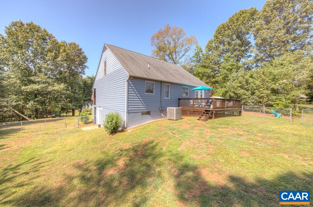 235 Spring Oaks Lane Ruckersville, VA 22968 - Photo 3 of 44 a house view with swimming pool in front of it
