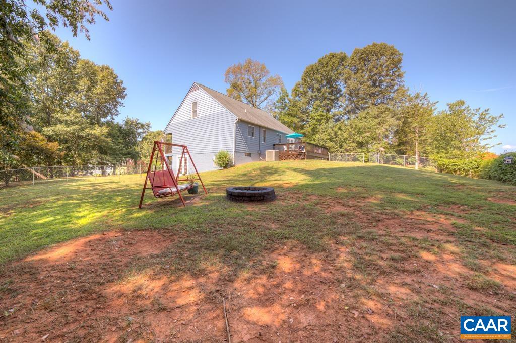 235 Spring Oaks Lane Ruckersville, VA 22968 - Photo 43 of 44 a view of a house with a yard