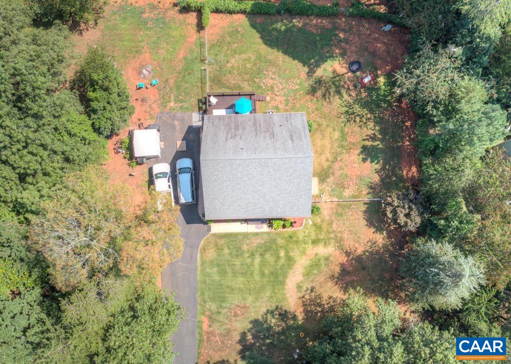 235 Spring Oaks Lane Ruckersville, VA 22968 - Photo 6 of 44 an aerial view of residential house with outdoor space and trees all around