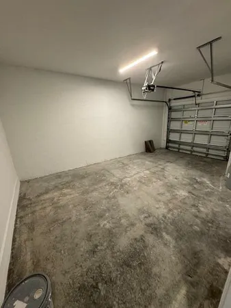 a view of a lake with houses in the back