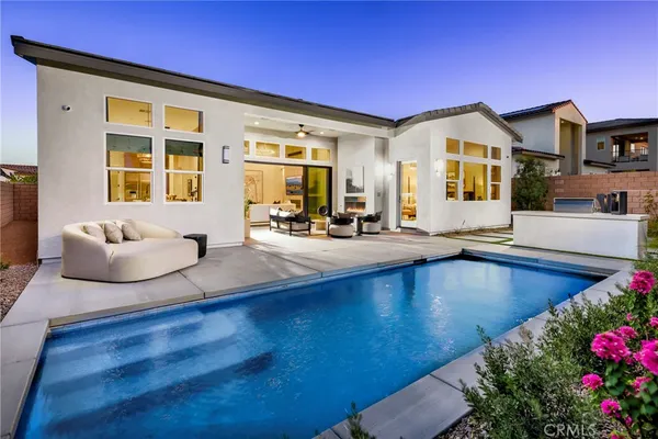 a view of a living room and dining room