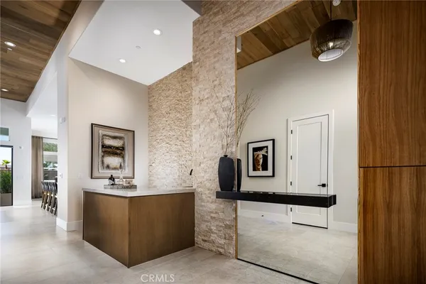 a bathroom with a sink a mirror and vanity