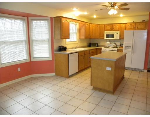 203 East Harbison Road Pittsburgh, PA 15205 - Photo 7 of 18 Kitchen. The eat-in kitchen offers a bump out bay area, island, pantry, gas stove, dishwasher, access to the garage.