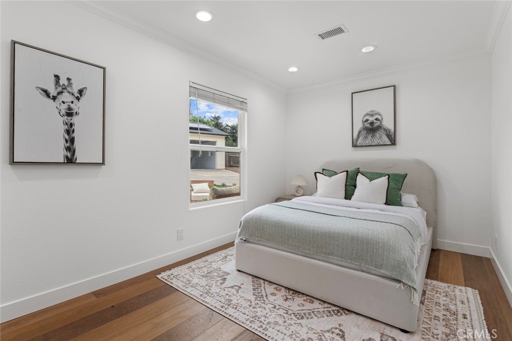 2162 Montgomery Road Thousand Oaks, CA 91360 - Photo 12 of 26 a bedroom with a large bed and a window
