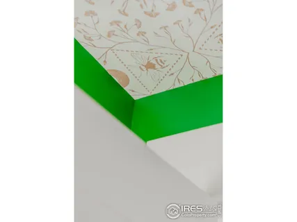 a view of living room with furniture and wooden floor