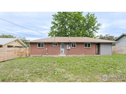 a black and white photo of a living room