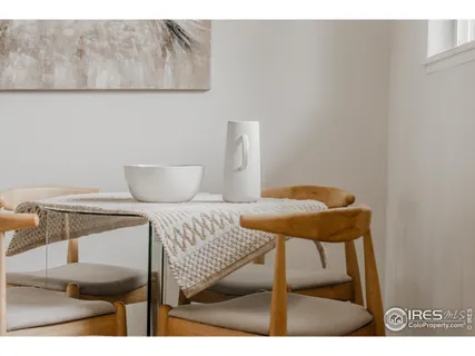 a bedroom with a bed and a table in it