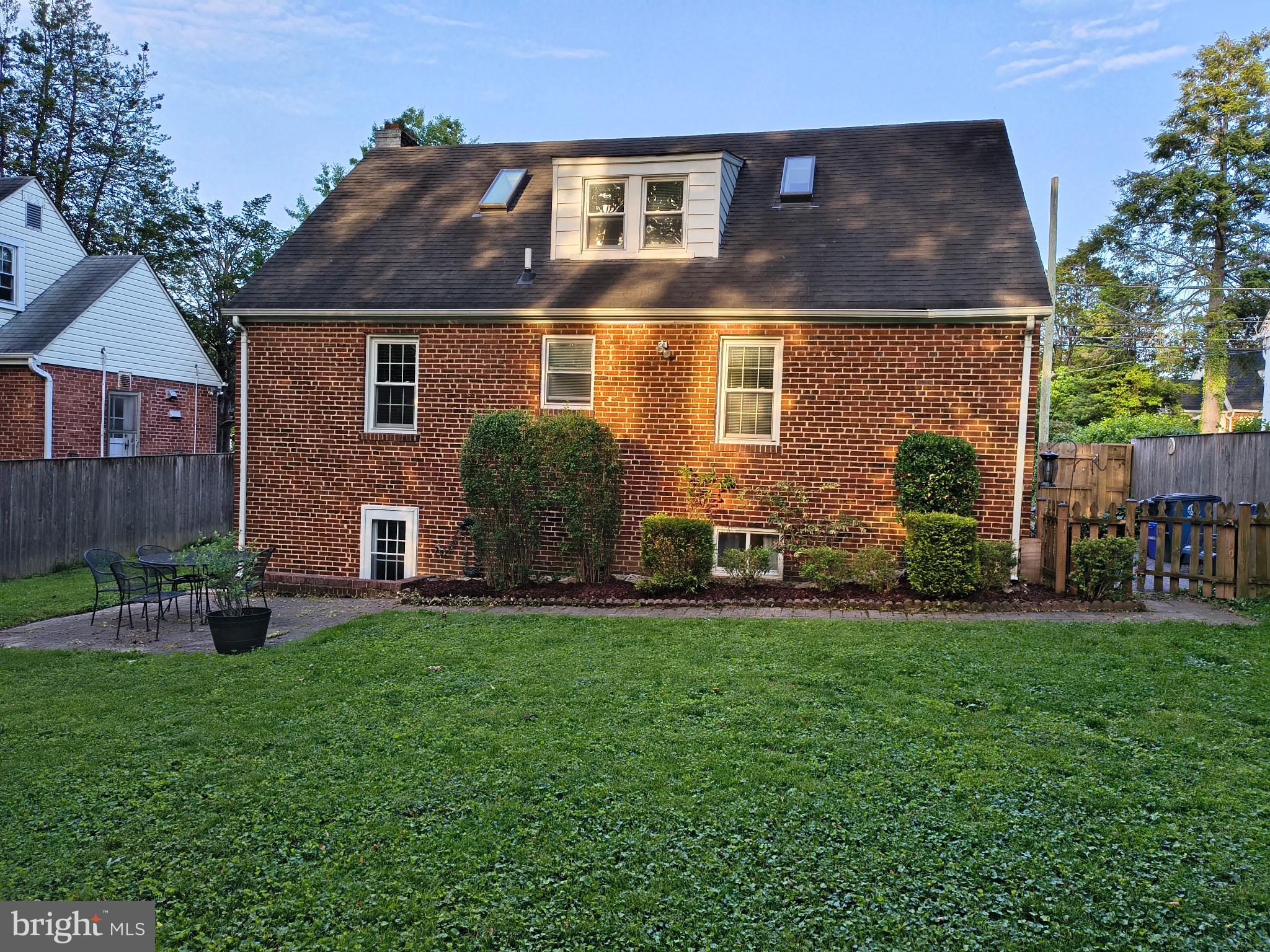 9316 Sudbury Road Silver Spring, MD 20901 - Photo 19 of 19 a front view of house with yard and outdoor seating