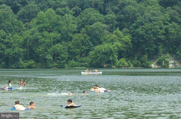 7148 Masters Road New Market, MD 21774 - Photo 3 of 12 Beach swimming area at lake