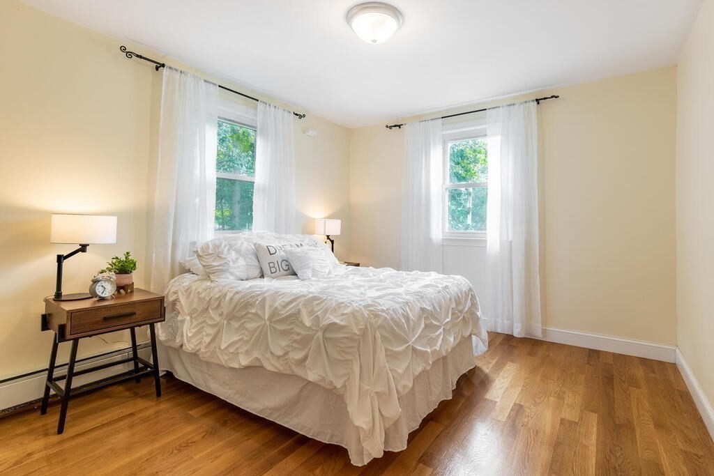 18 Woodbury Road Billerica, MA 01821 - Photo 18 of 30 a bedroom with a bed and a window