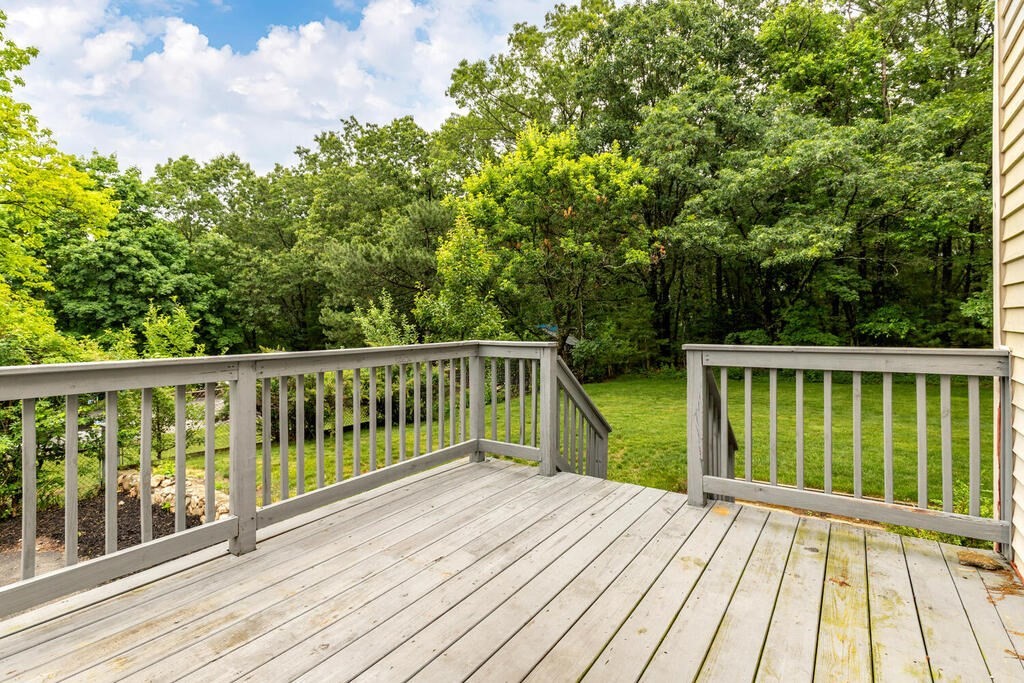 18 Woodbury Road Billerica, MA 01821 - Photo 25 of 30 a view of a wooden deck
