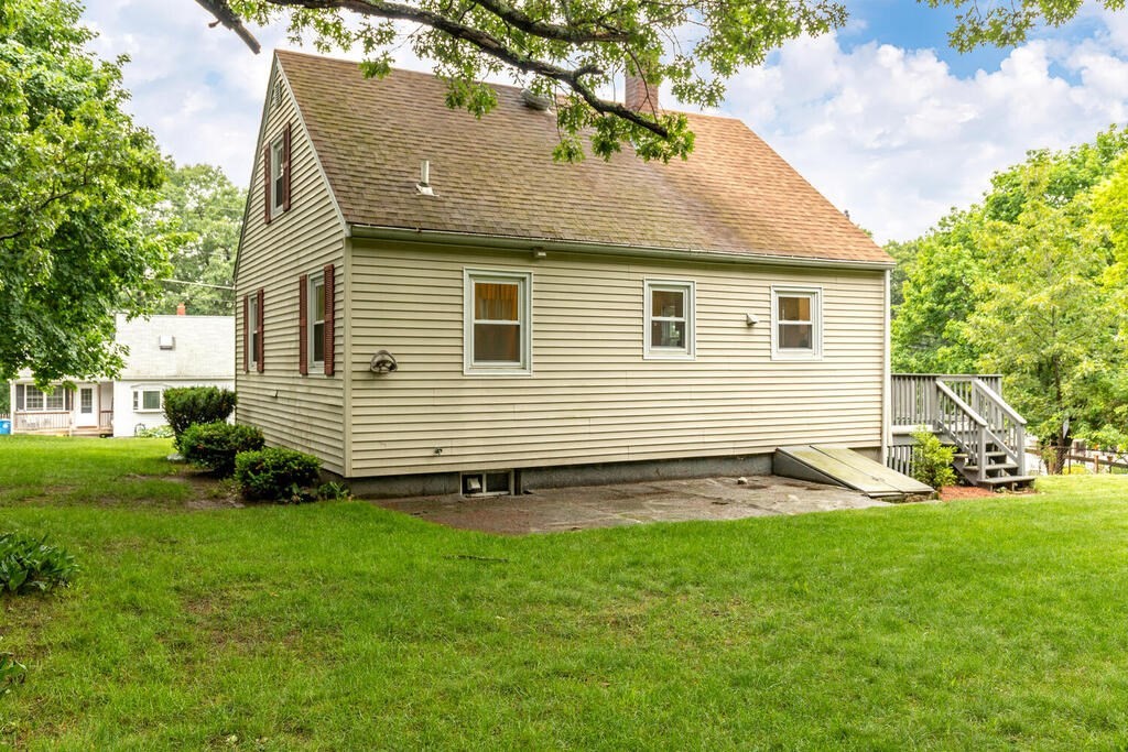 18 Woodbury Road Billerica, MA 01821 - Photo 28 of 30 a view of a backyard with plants and a backyard
