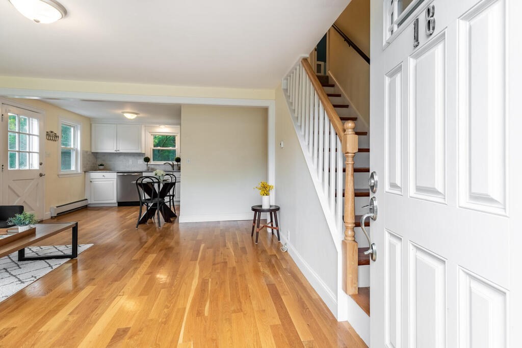 18 Woodbury Road Billerica, MA 01821 - Photo 5 of 30 a living room with furniture and a wooden floor