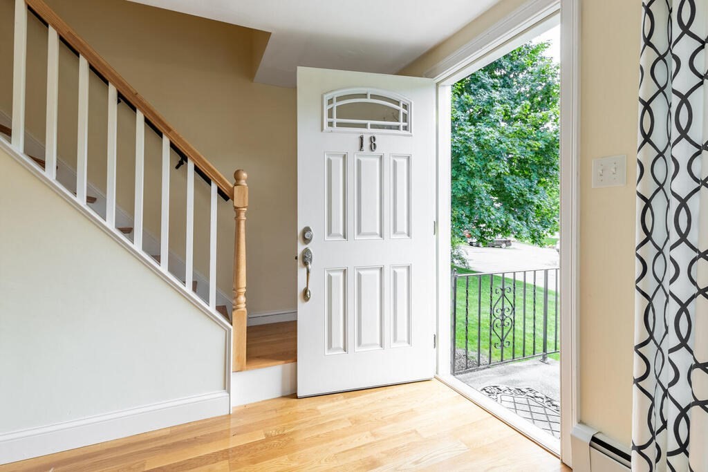 18 Woodbury Road Billerica, MA 01821 - Photo 6 of 30 a view of an entryway with a floor to ceiling window