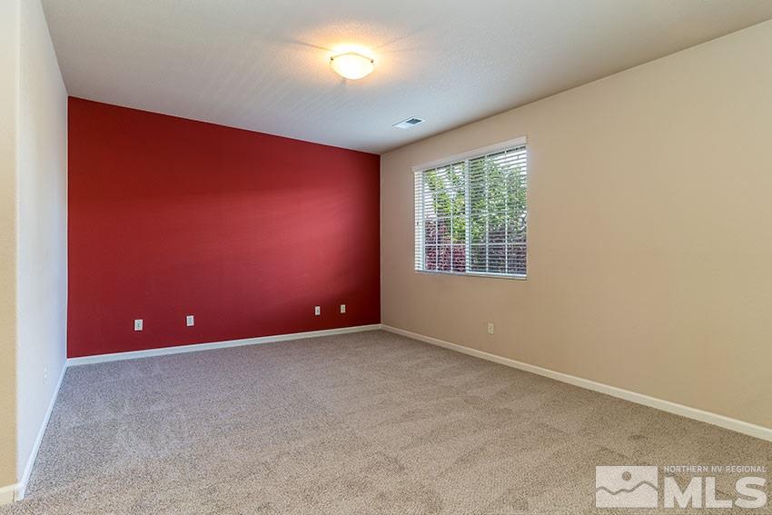 1815 Stetson Drive Reno, NV 89521 - Photo 11 of 20 an empty room with windows and closet