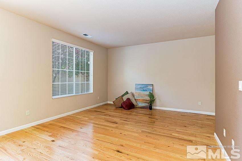 1815 Stetson Drive Reno, NV 89521 - Photo 9 of 20 a bedroom with a bed and a window