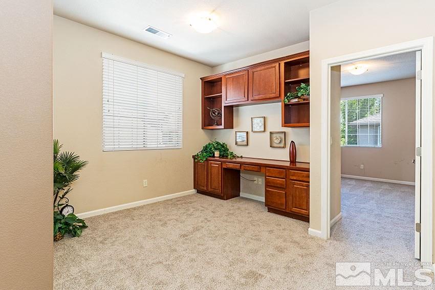 1815 Stetson Drive Reno, NV 89521 - Photo 10 of 20 a kitchen with a refrigerator and stove