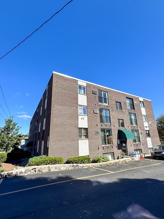 505 Washington, Unit 46 Chelsea, MA 02150 - Photo 1 of 16 a view of a building with a street