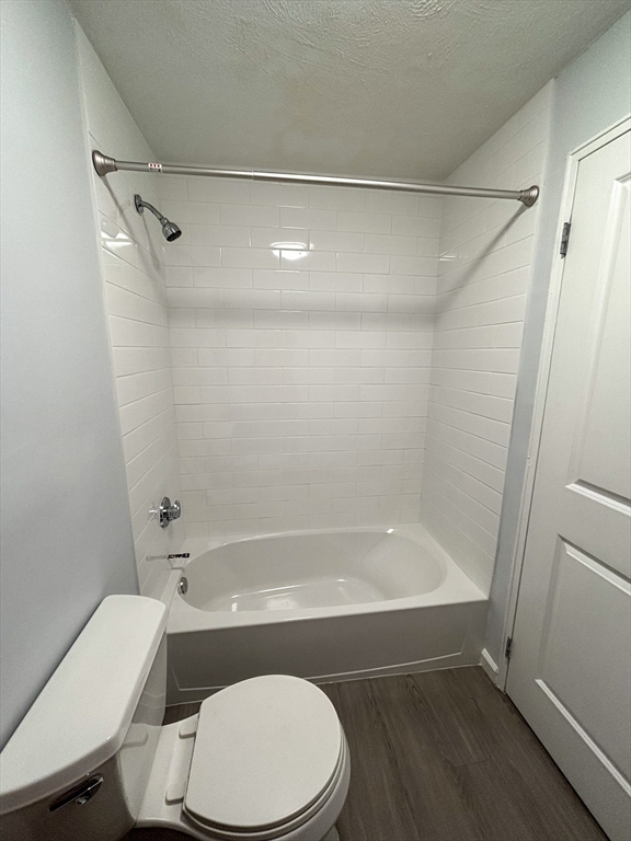 505 Washington, Unit 46 Chelsea, MA 02150 - Photo 9 of 16 a bathroom with a sink a toilet and a bathtub
