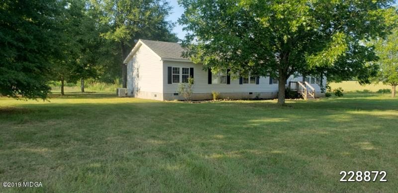448 Scott Road Elko, GA 31025 - Photo 2 of 13 a view of a house with a yard